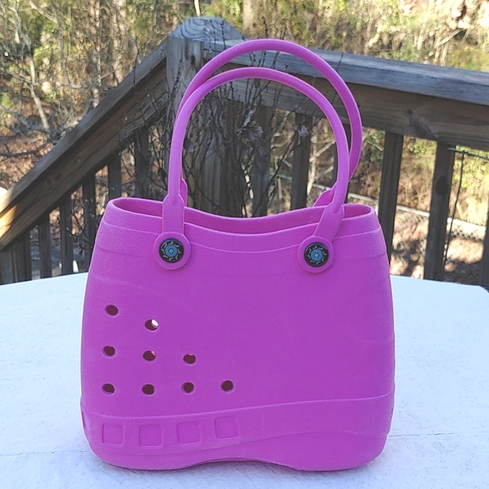 Ladies Optari rubber bag, 11" x 4..5" x 8.5", pink, great condition